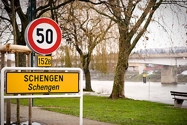  Luxembourg,Schengen,Schengen Roadsign and the old bridge in the background